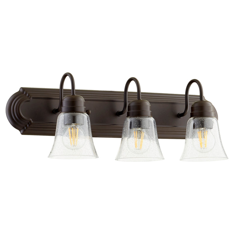 Quorum 5094-3-286 Three Light Vanity, Oiled Bronze w/ Clear/Seeded