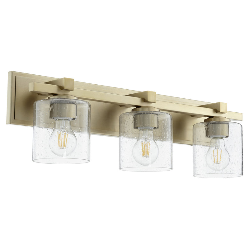 Quorum 5369-3-280 Three Light Vanity, Aged Brass w/ Clear/Seeded