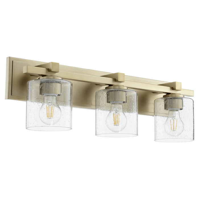 Quorum 5369-3-280 Three Light Vanity, Aged Brass w/ Clear/Seeded