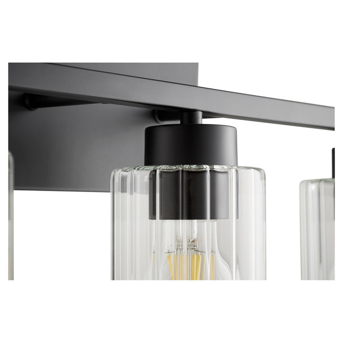 Quorum 501-3-69 Three Light Vanity, Textured Black w/ Clear Fluted Glass
