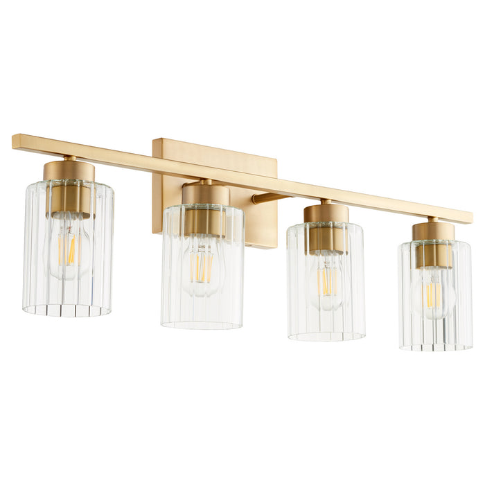Quorum 501-4-280 Four Light Vanity, Aged Brass w/ Clear Fluted Glass