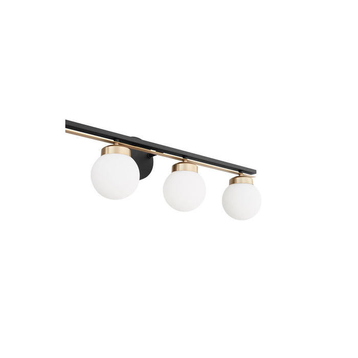 Quorum 506-4-6980 Four Light Vanity, Textured Black w/ Aged Brass