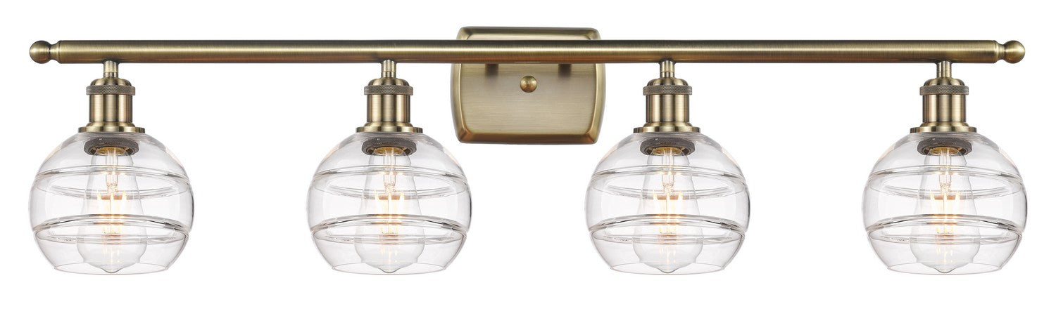 Innovations 516-4W-AB-G556-6CL Four Light Bath Vanity, Antique Brass