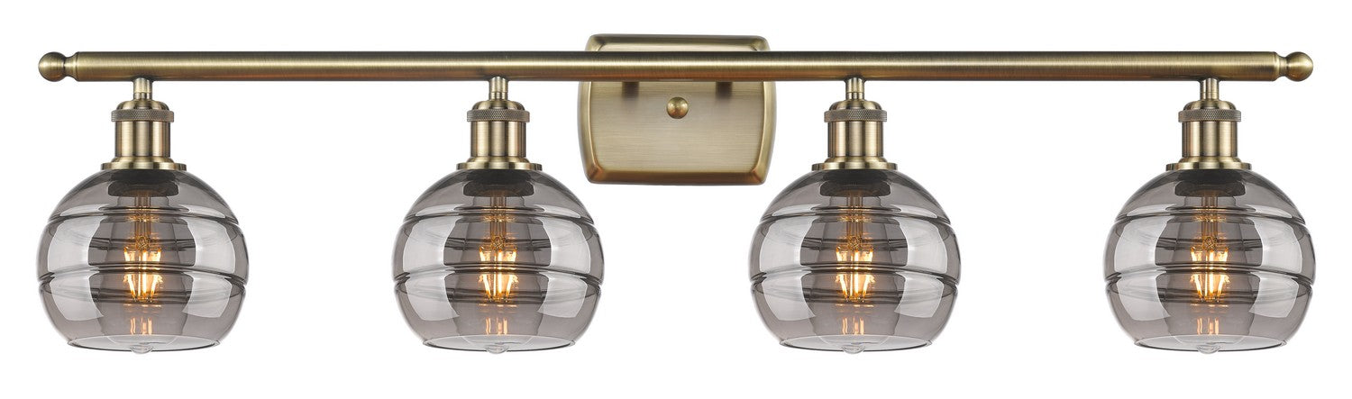 Innovations 516-4W-AB-G556-6SM Four Light Bath Vanity, Antique Brass