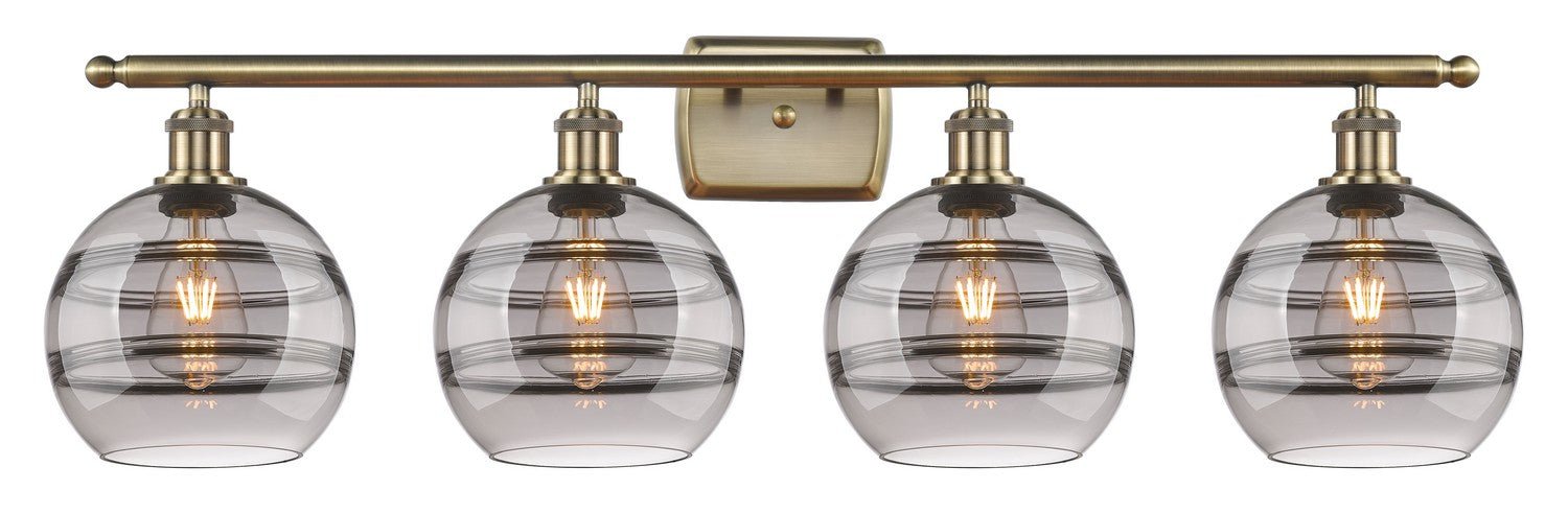 Innovations 516-4W-AB-G556-8SM Four Light Bath Vanity, Antique Brass