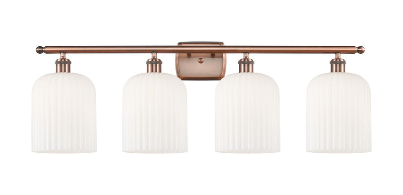 Innovations 516-4W-AC-G559-8GWH Four Light Bath Vanity, Antique Copper