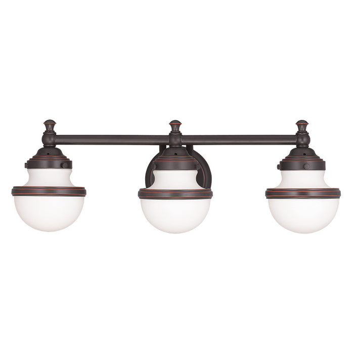 Livex Lighting 5713-67 Three Light Bath Vanity, Hand Applied Olde Bronze