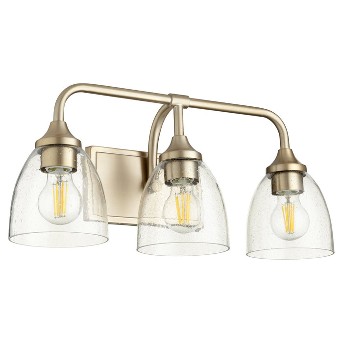 Quorum 5059-3-280 Three Light Vanity, Aged Brass w/ Clear/Seeded