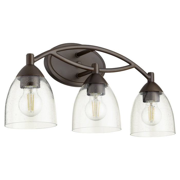Quorum 5069-3-286 Three Light Vanity, Oiled Bronze w/ Clear/Seeded