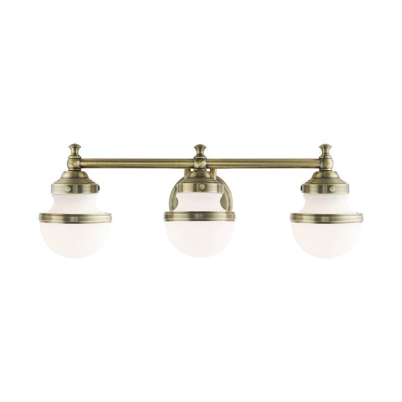 Livex Lighting 5713-01 Three Light Vanity, Antique Brass