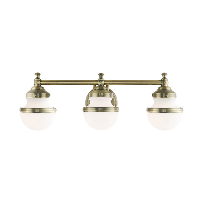 Livex Lighting 5713-01 Three Light Vanity, Antique Brass
