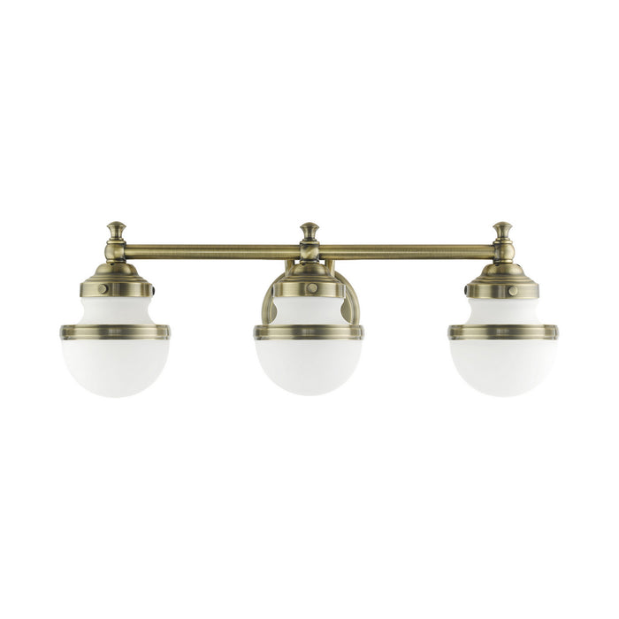 Livex Lighting 5713-01 Three Light Vanity, Antique Brass
