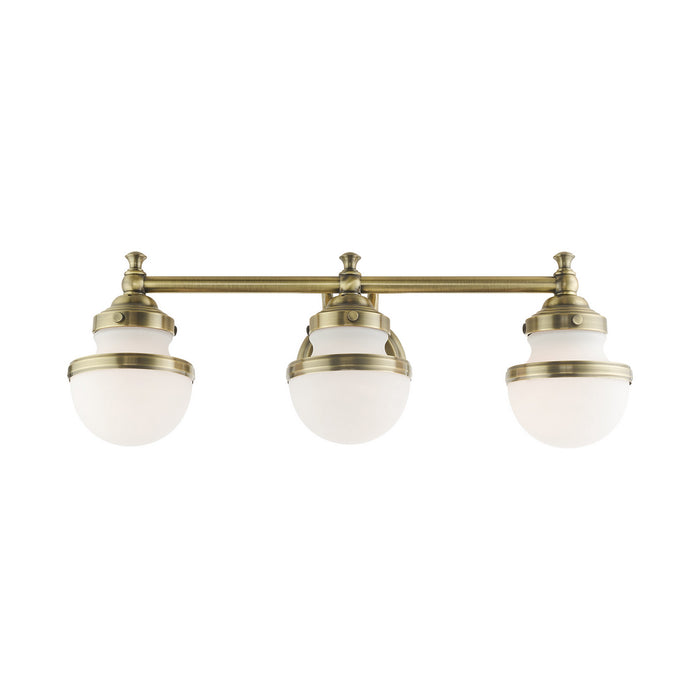 Livex Lighting 5713-01 Three Light Vanity, Antique Brass