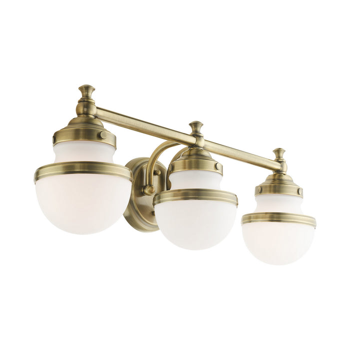 Livex Lighting 5713-01 Three Light Vanity, Antique Brass