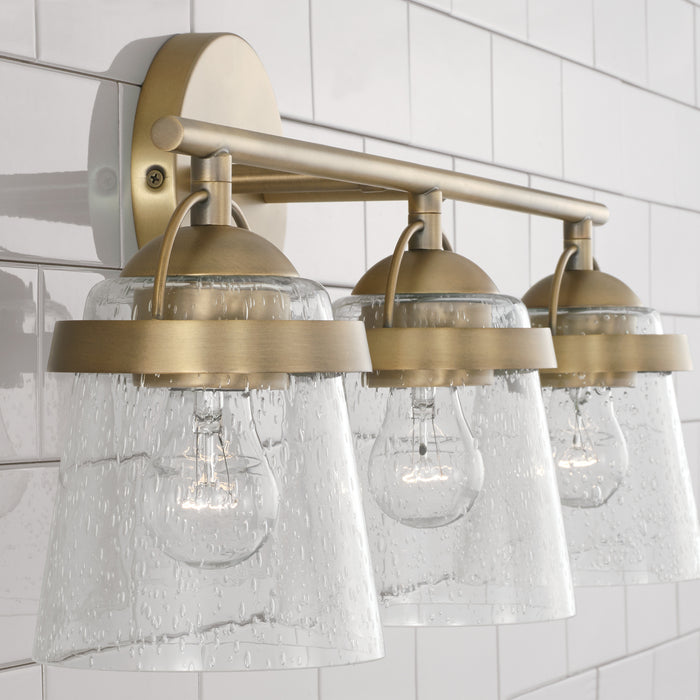 Capital Lighting 147031AD-534 Three Light Vanity, Aged Brass