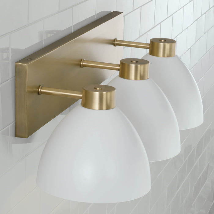 Capital Lighting 152031AW Three Light Vanity, Aged Brass and White