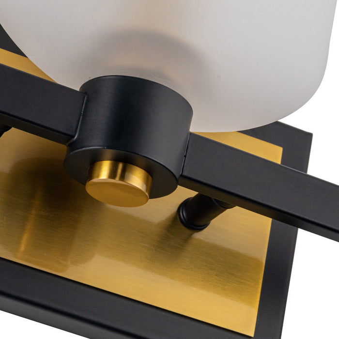 Artcraft AC11693BB Three Light Bathroom Vanity, Black and Brushed Brass